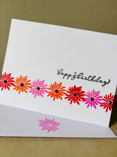 line of flowers - red/pink