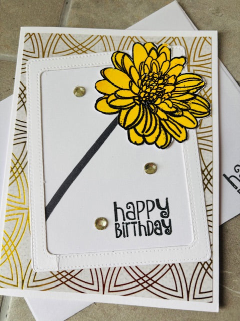 gold with yellow flower